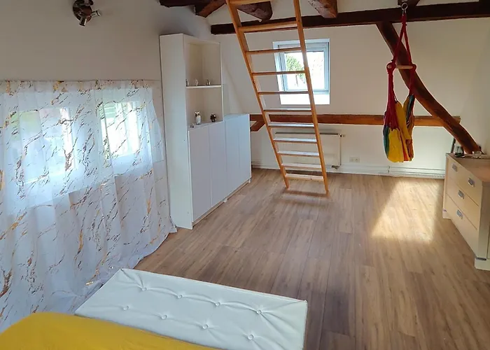 Δωμάτια σε οικογενειακή κατοικία Les 5 Hiboux *